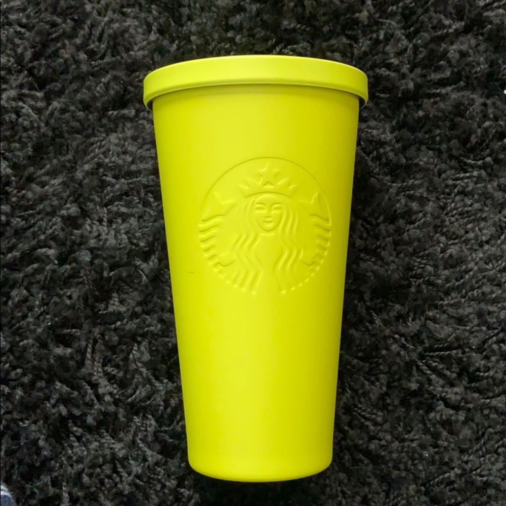 Neon yellow cup with stainless steel straw